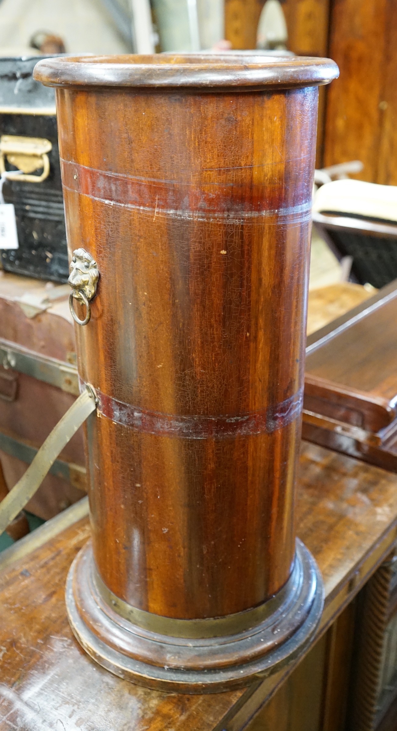 A late Victorian cylindrical mahogany stick stand with liner, diameter 29cm, height 66cm